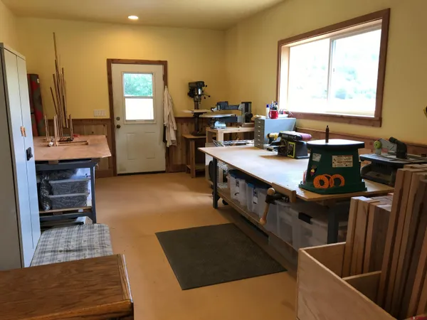 a kitchen with sink cabinets and appliances