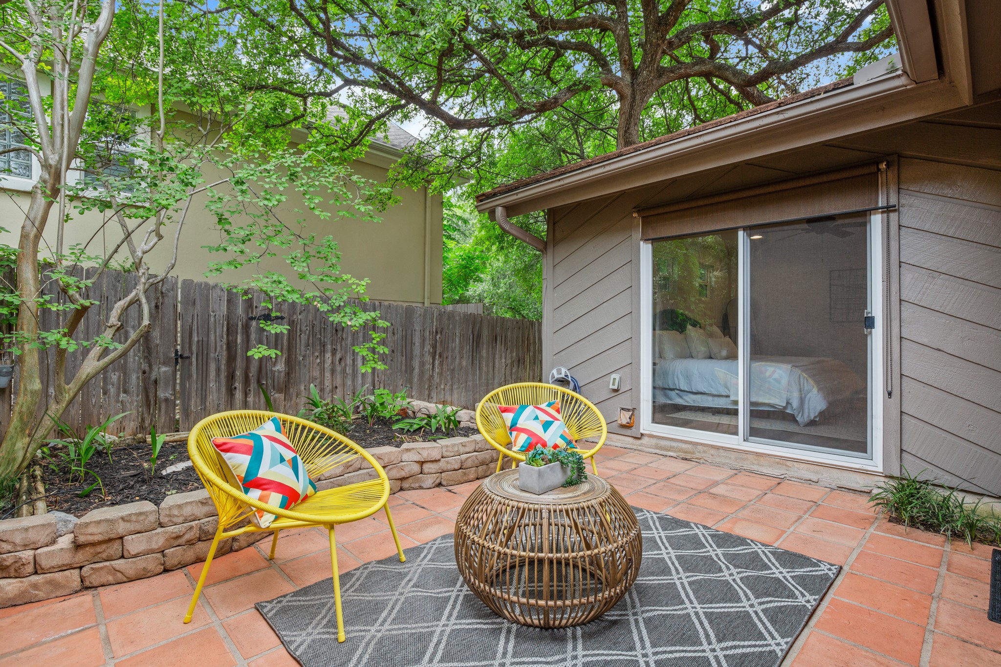 4116 Creek Ledge, Unit 108 Austin, TX 78731 - Photo 23 of 35 Enjoy your outdoor space in private with tall fencing plus shade from towering mature trees.