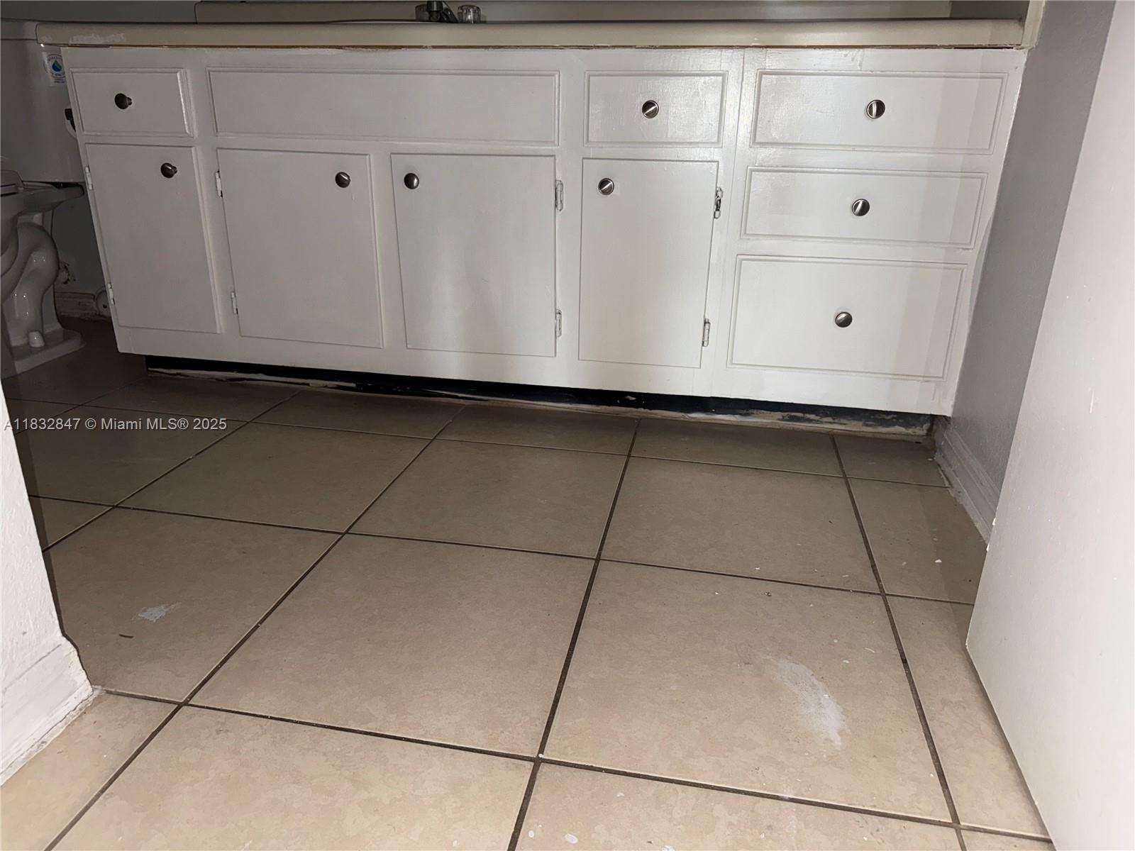 3320 Pinewalk Drive North, Unit 1715 Margate, FL 33063 - Photo 27 of 35 a view of white cabinets