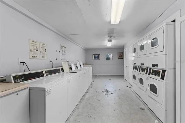 a view of living room with furniture and window