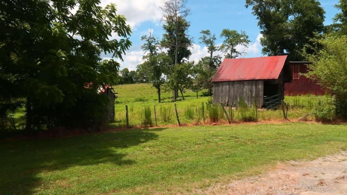 0 Henry Evans Road Ellijay, GA 30536 - Photo 1 of 1 a front view of a house with a yard