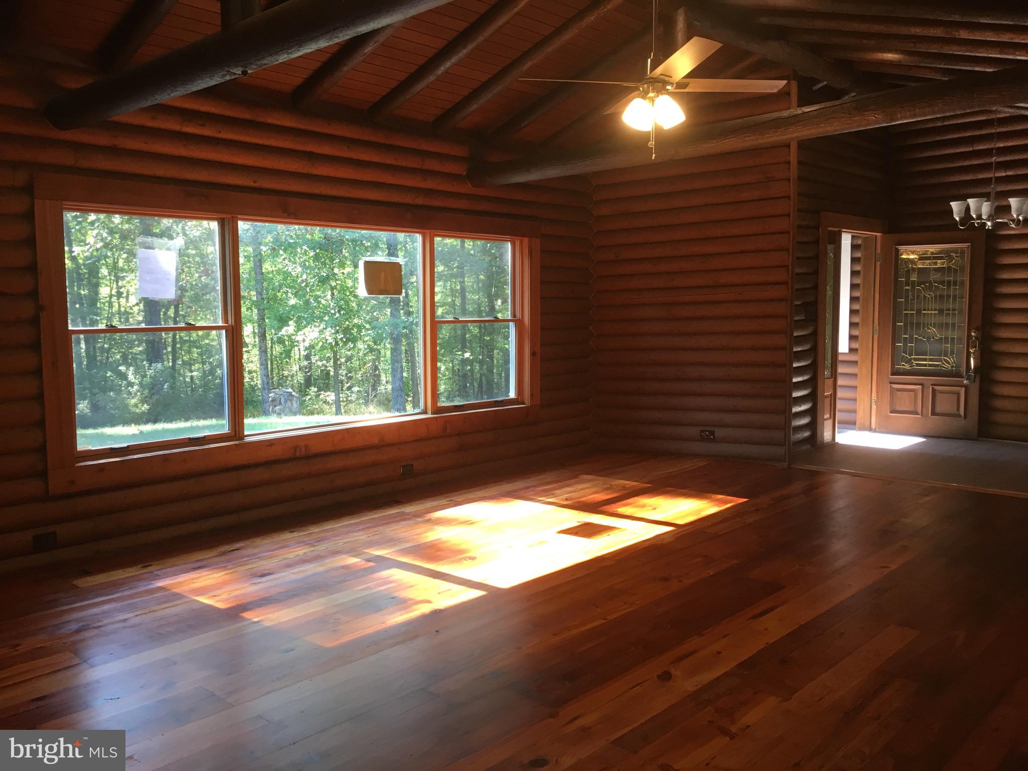 6157 Wilson Road Marshall, VA 20115 - Photo 13 of 35 a view of empty room with wooden floor and fan