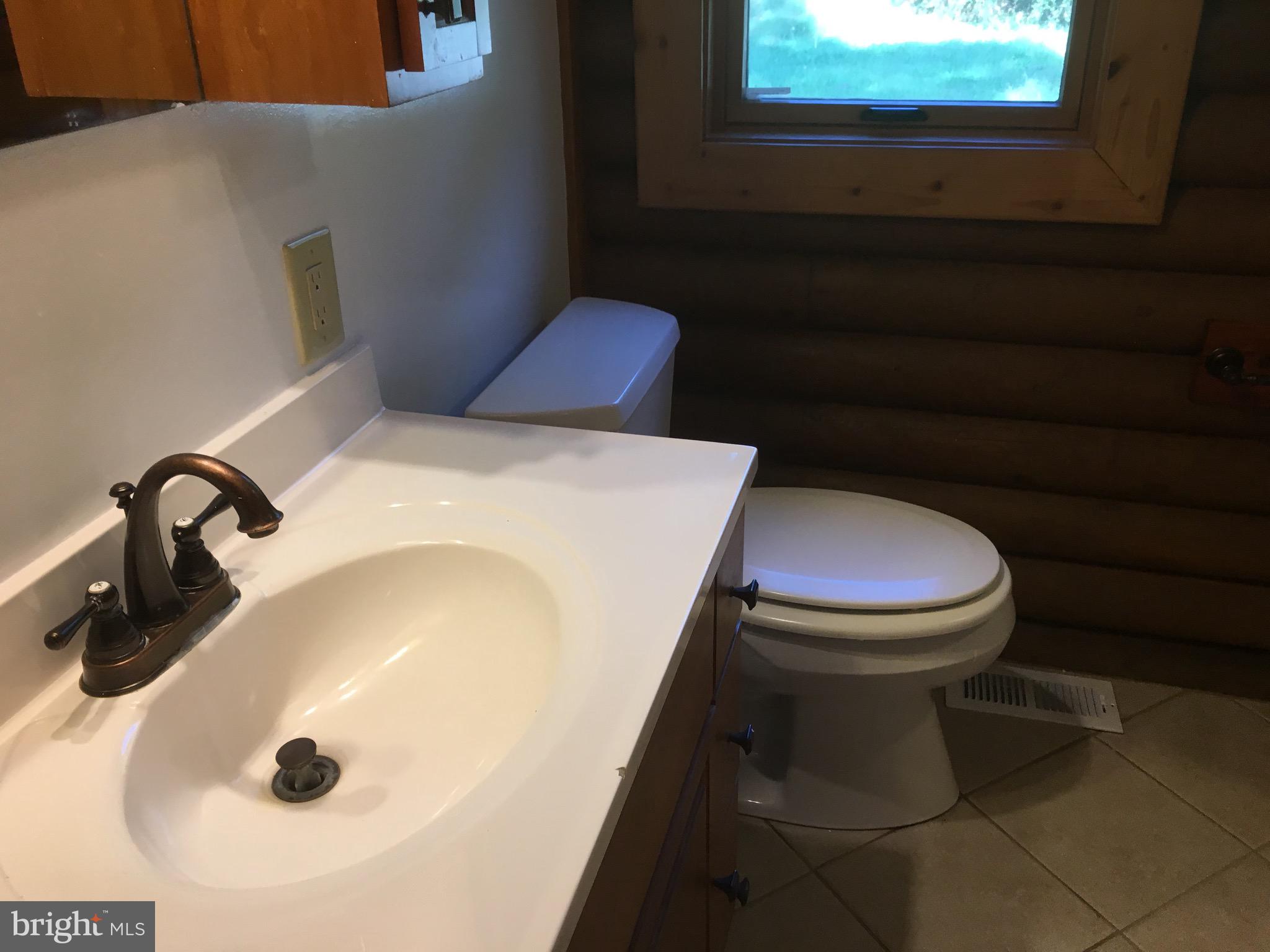 6157 Wilson Road Marshall, VA 20115 - Photo 27 of 35 a bathroom with a toilet and a sink