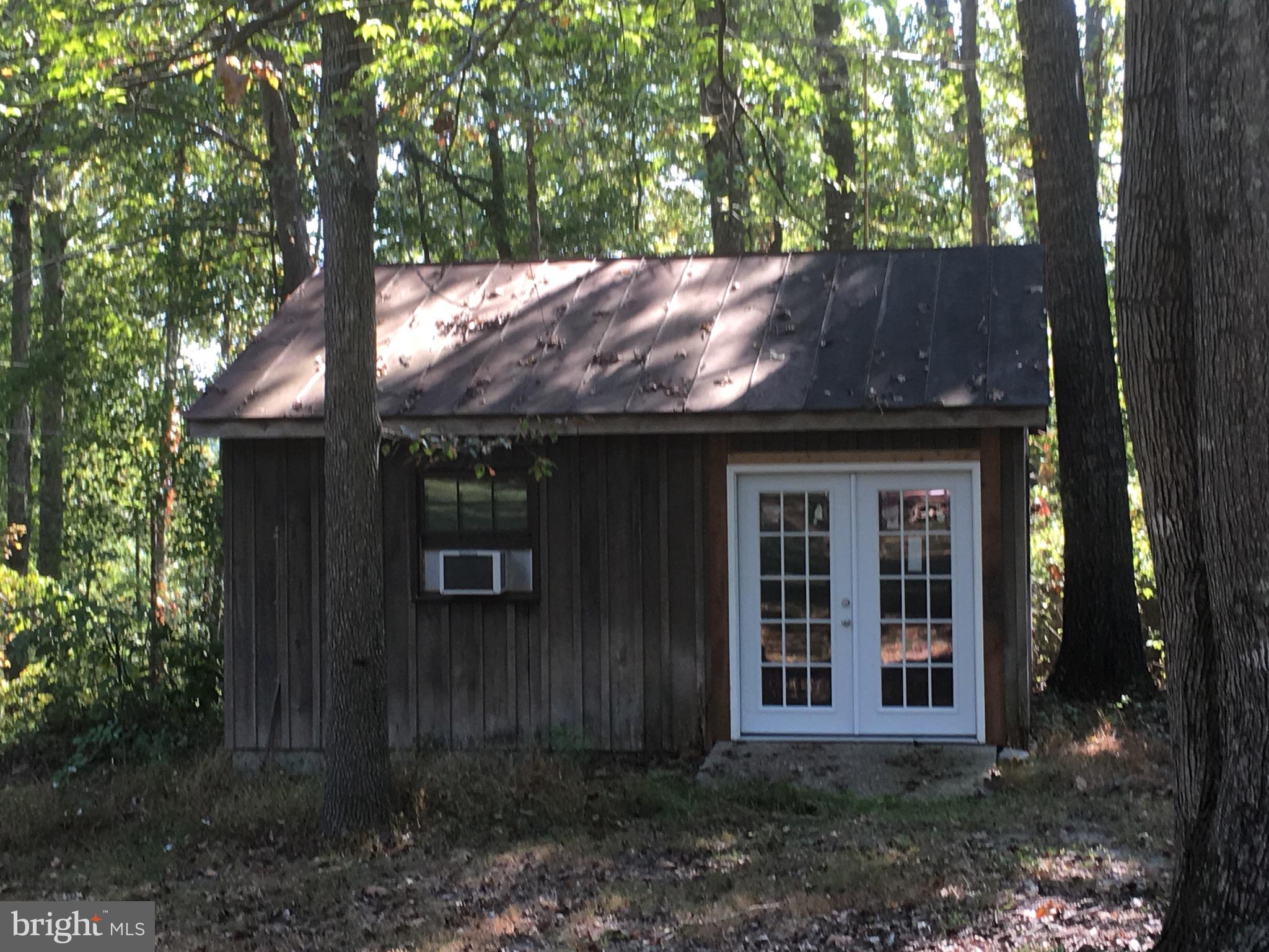 6157 Wilson Road Marshall, VA 20115 - Photo 34 of 35 a view of a house with a tree