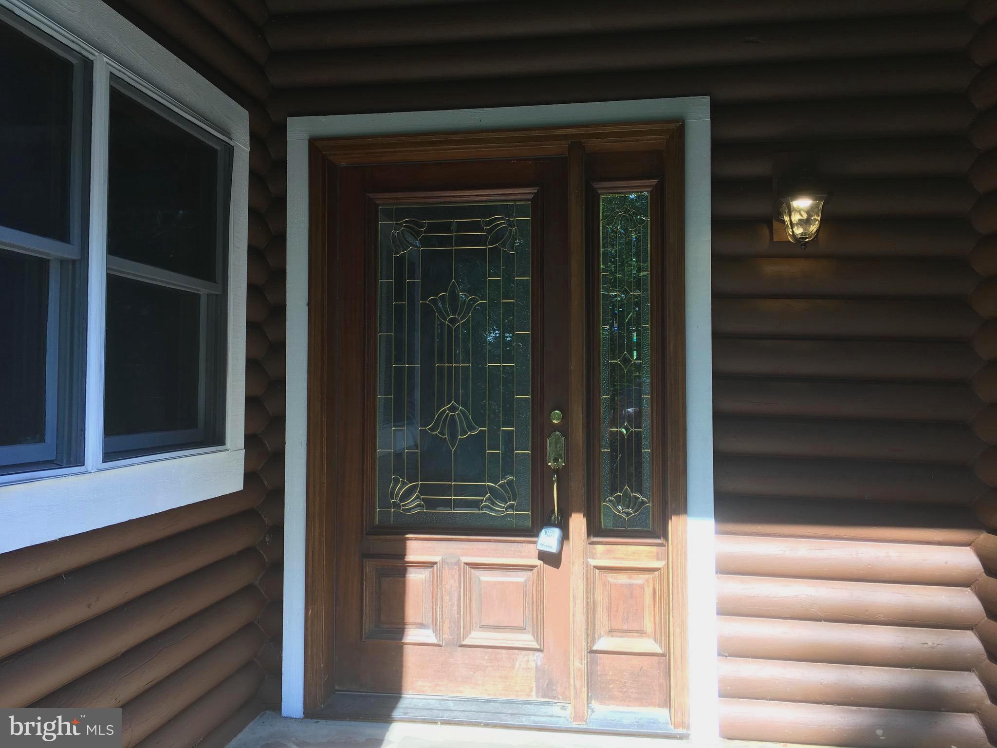 6157 Wilson Road Marshall, VA 20115 - Photo 7 of 35 a view of front door