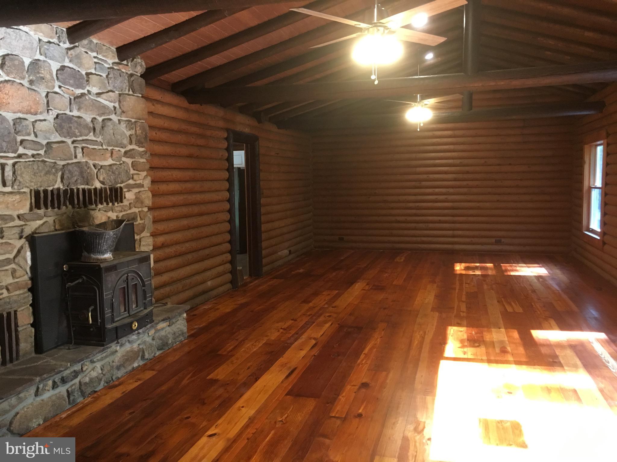6157 Wilson Road Marshall, VA 20115 - Photo 9 of 35 a view of an empty room with wooden floor