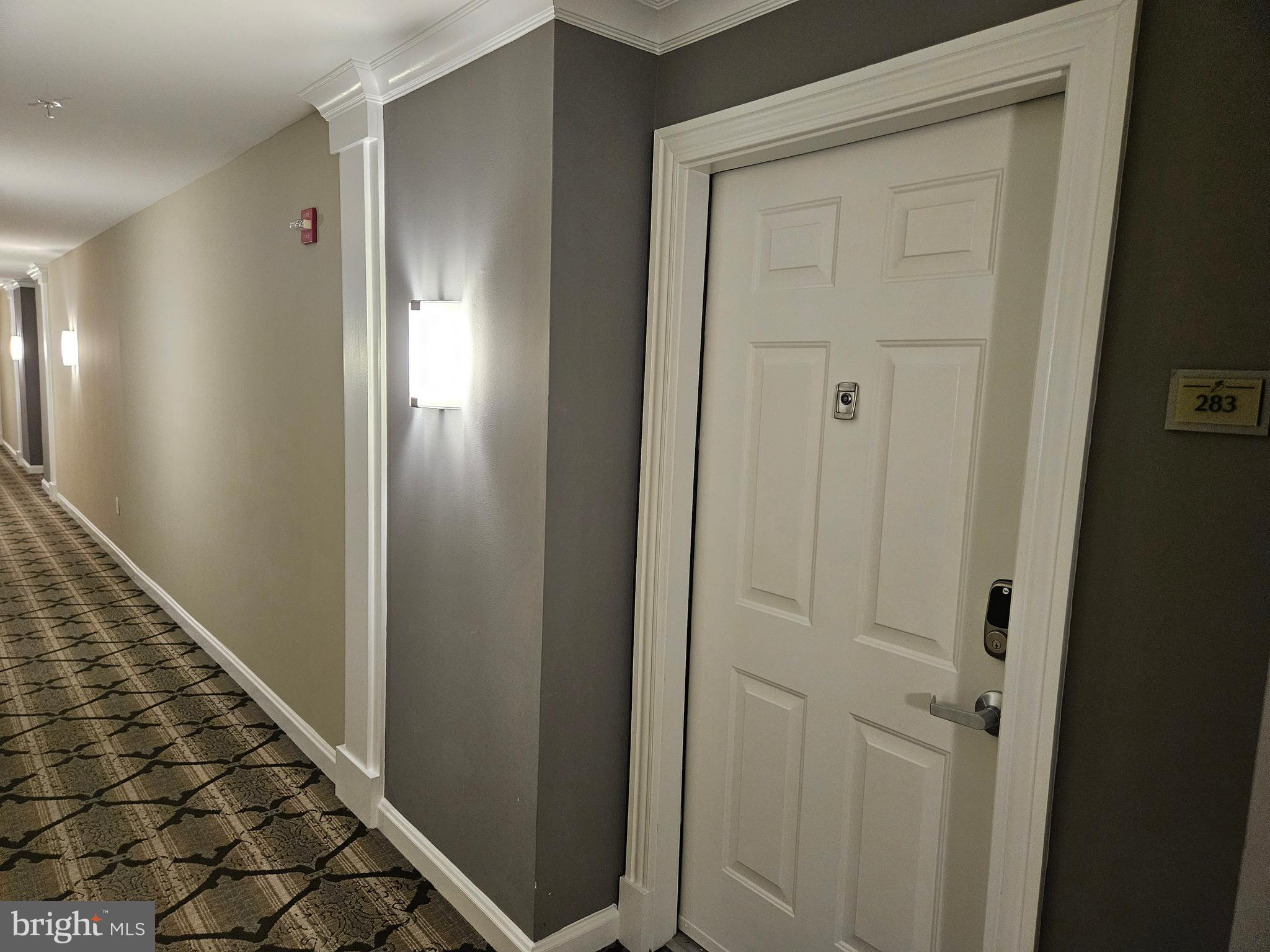12000 Market Street, Unit 283 Reston, VA 20190 - Photo 4 of 36 a view of a hallway