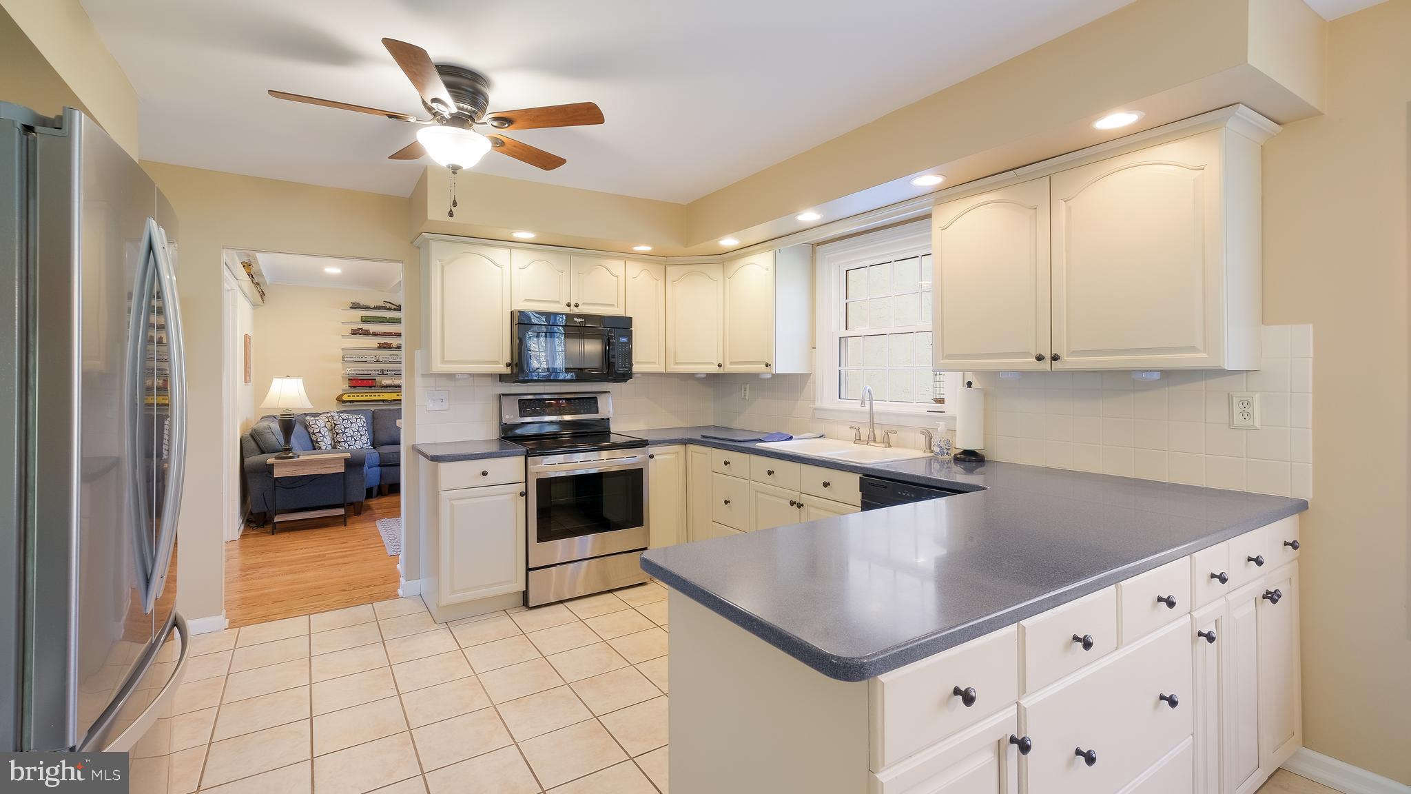12 Pine Valley Road Doylestown, PA 18901 - Photo 12 of 63 a kitchen with granite countertop a sink counter top space appliances and cabinets