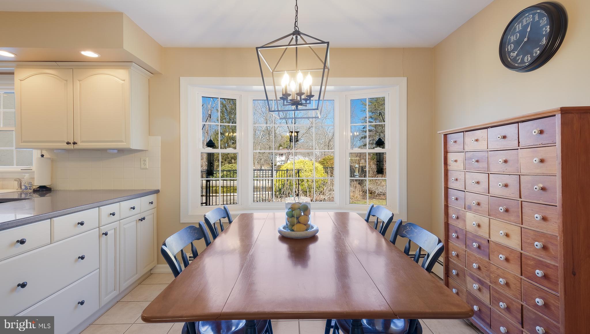 12 Pine Valley Road Doylestown, PA 18901 - Photo 14 of 63 a view of dining table furniture and chandelier