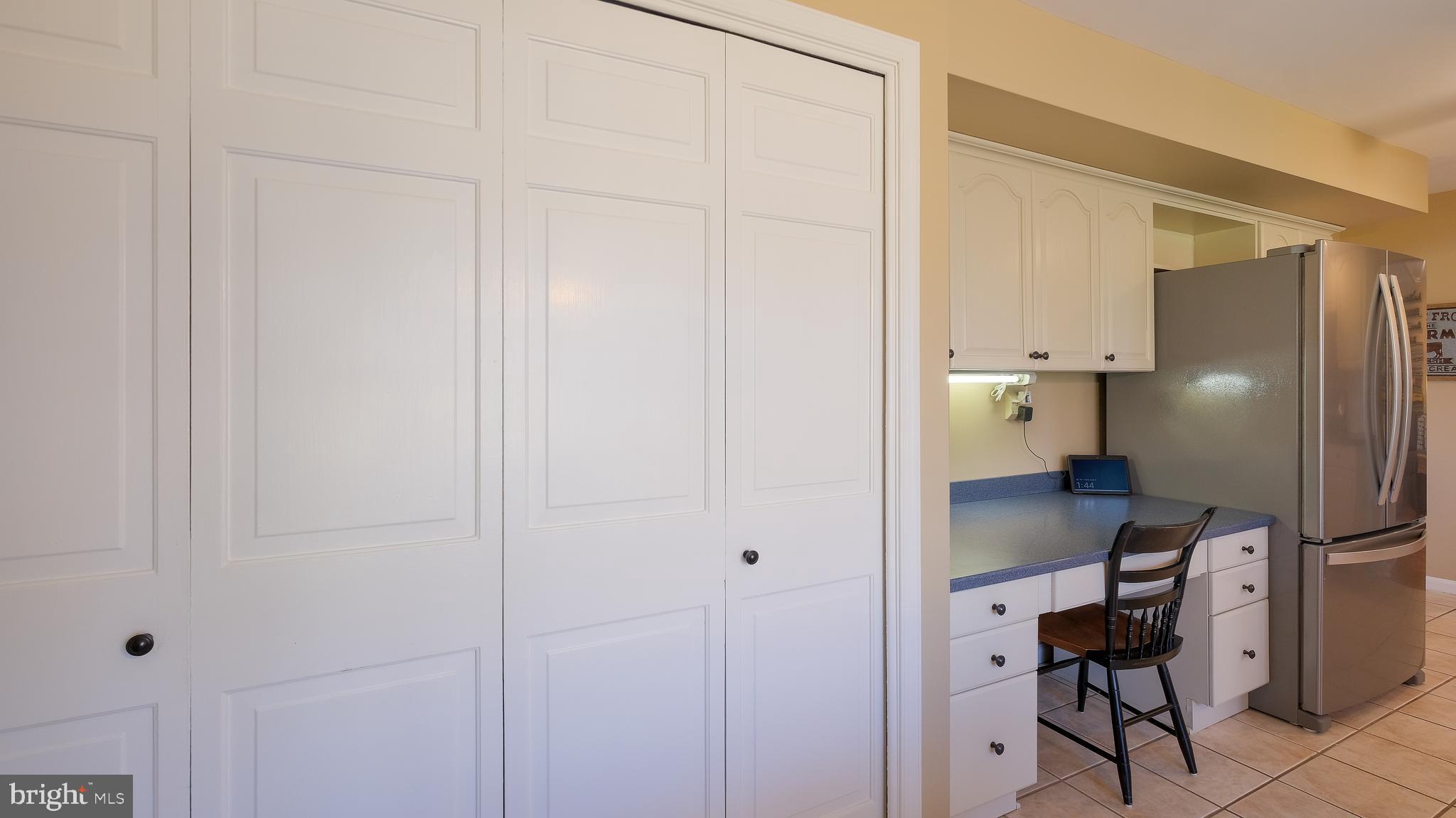 12 Pine Valley Road Doylestown, PA 18901 - Photo 16 of 63 a kitchen with a refrigerator and cabinets