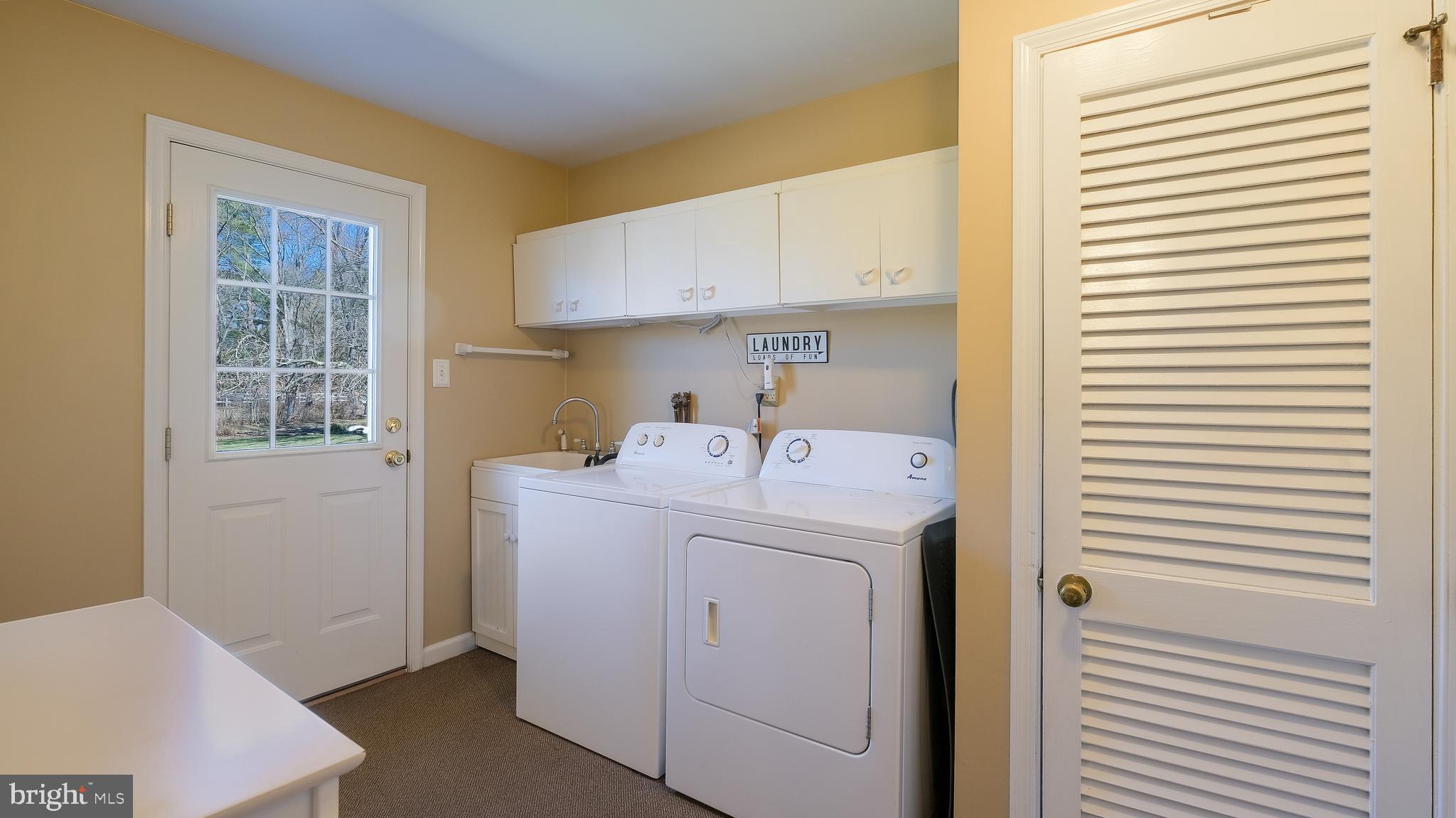 12 Pine Valley Road Doylestown, PA 18901 - Photo 18 of 63 a utility room with dryer and washer