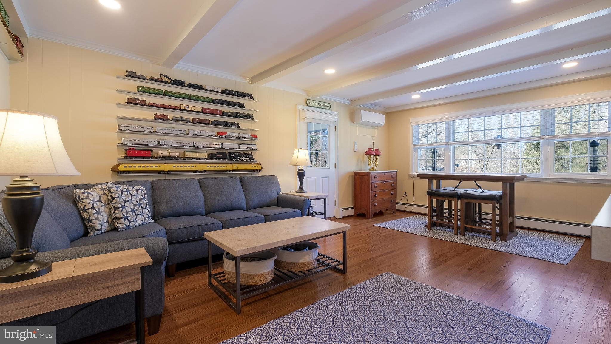 12 Pine Valley Road Doylestown, PA 18901 - Photo 20 of 63 Beamed Family Room w/ wood floors, entry to Porch.