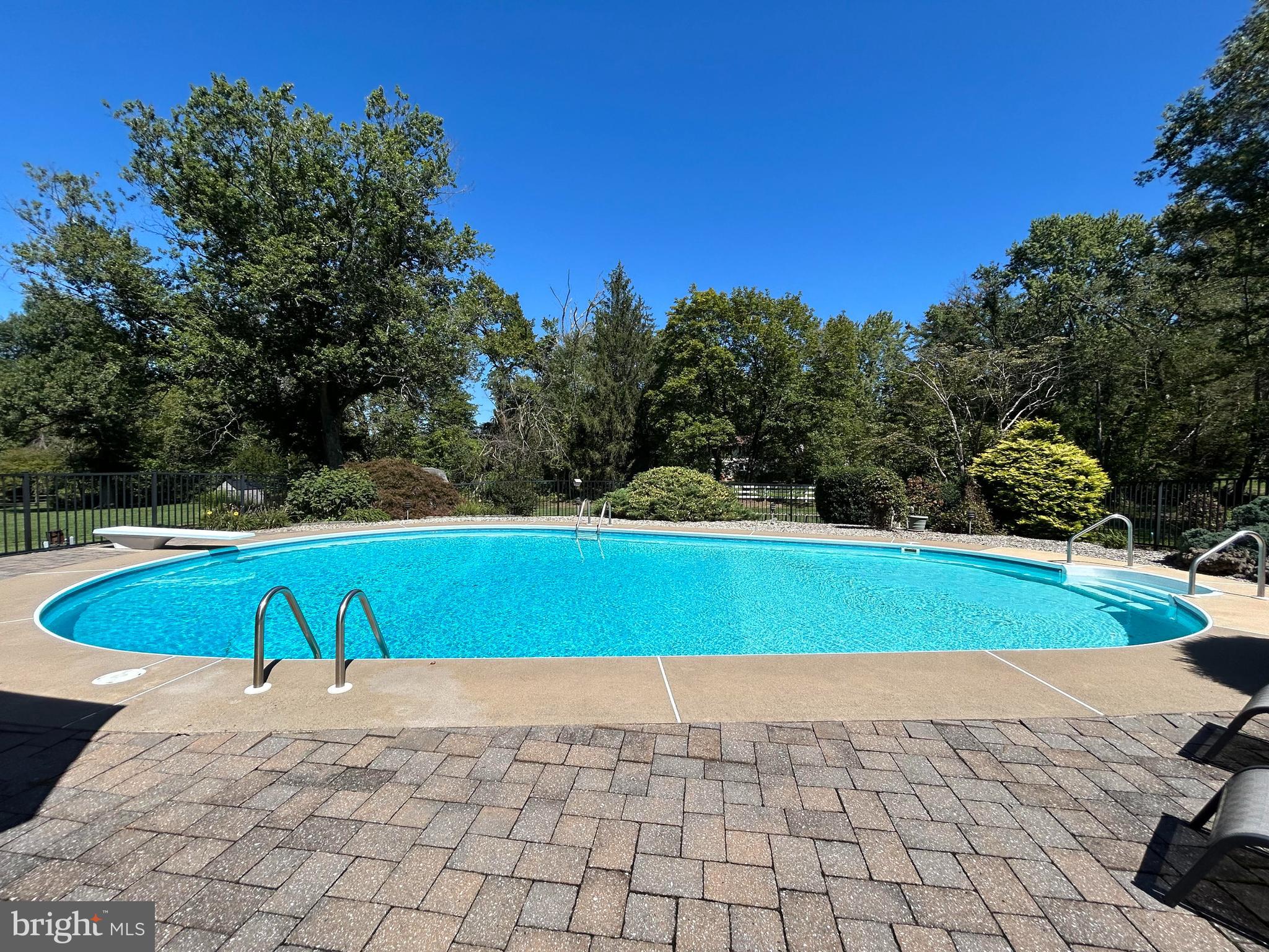 12 Pine Valley Road Doylestown, PA 18901 - Photo 2 of 63 a view of a swimming pool with an outdoor space