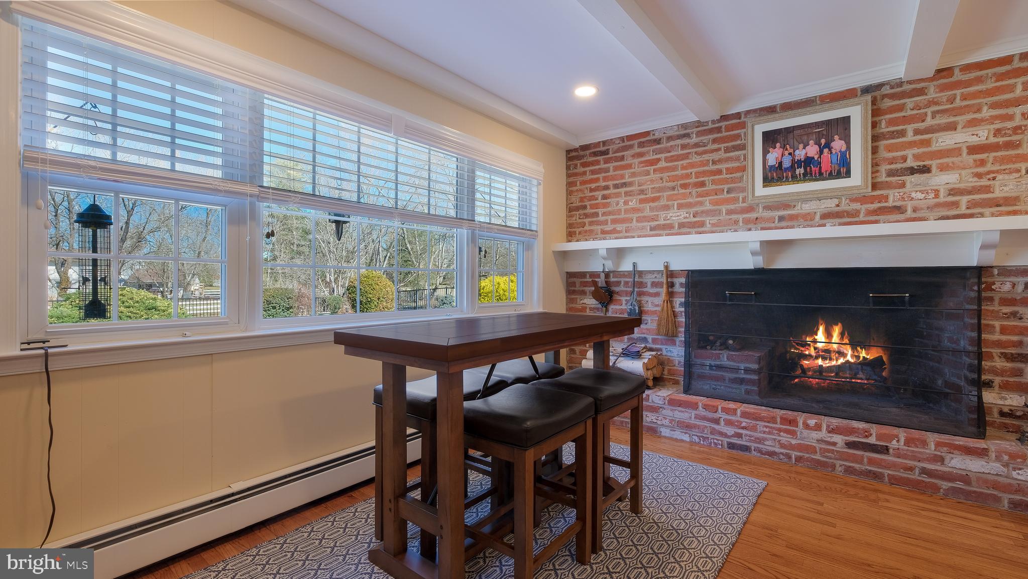 12 Pine Valley Road Doylestown, PA 18901 - Photo 22 of 63 a view of a dining room with furniture window and wooden floor