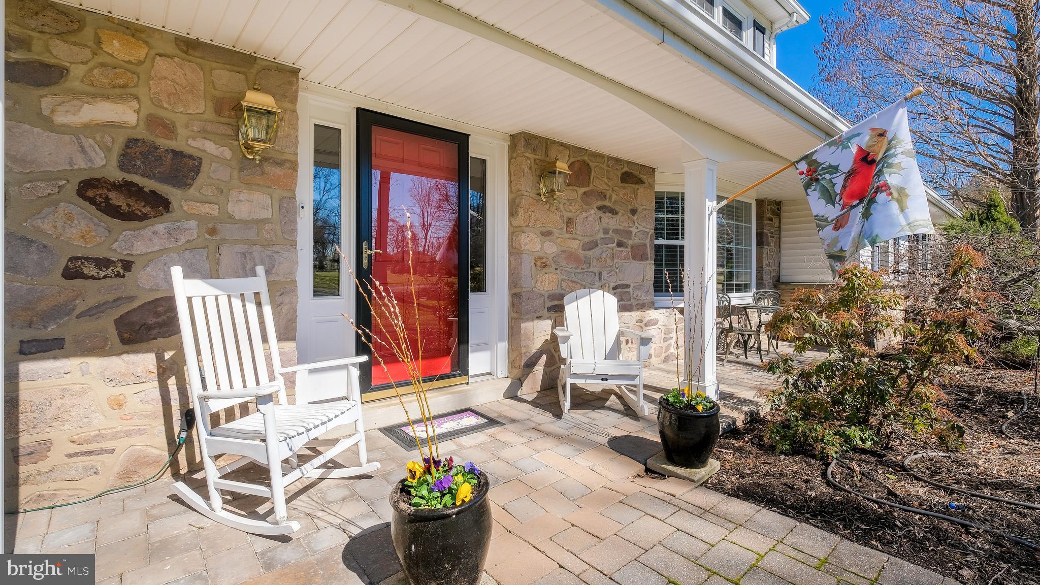 12 Pine Valley Road Doylestown, PA 18901 - Photo 3 of 63 a front view of a house with outdoor seating