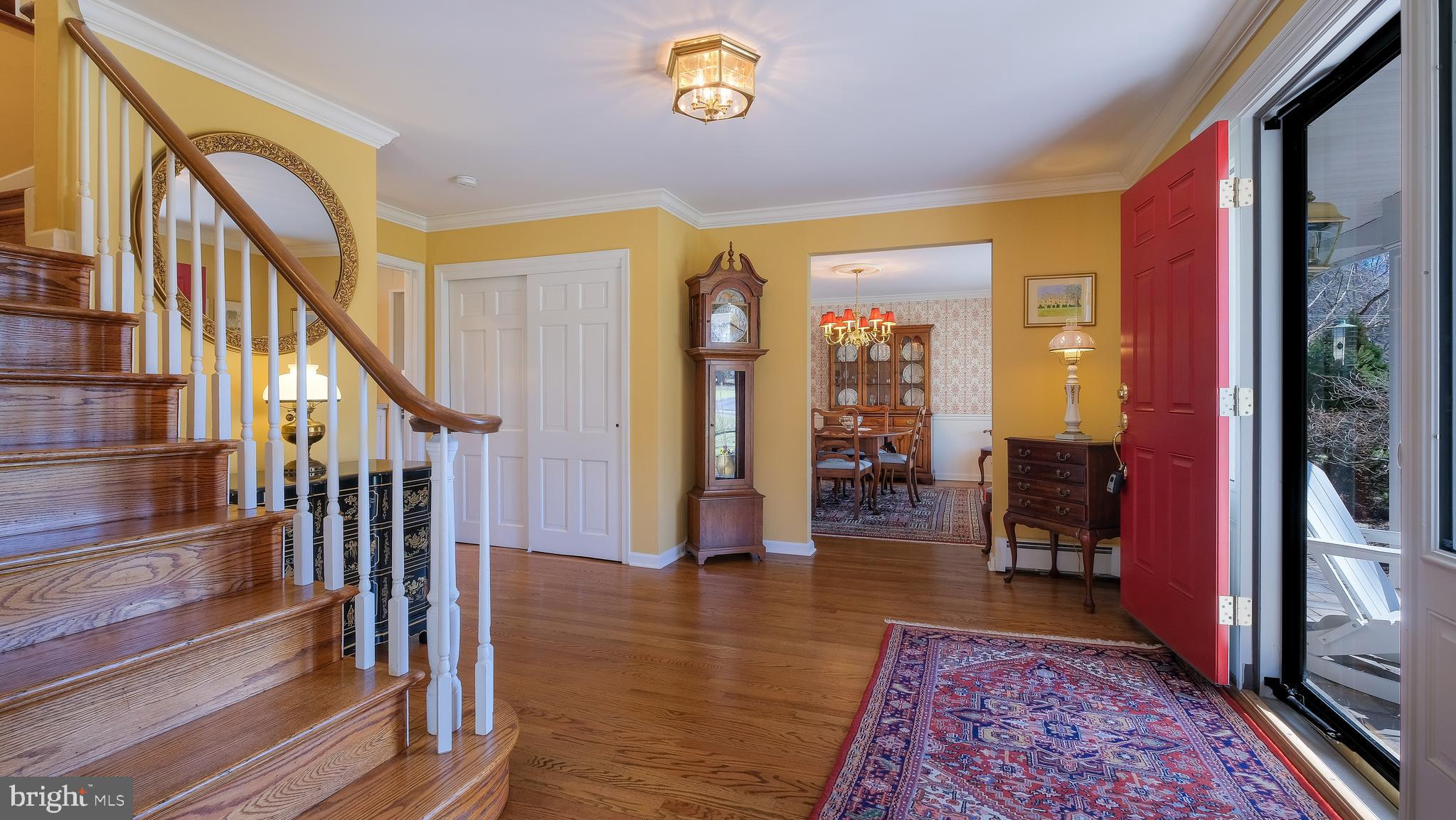 12 Pine Valley Road Doylestown, PA 18901 - Photo 4 of 63 a view of an entryway with wooden floor and a rug