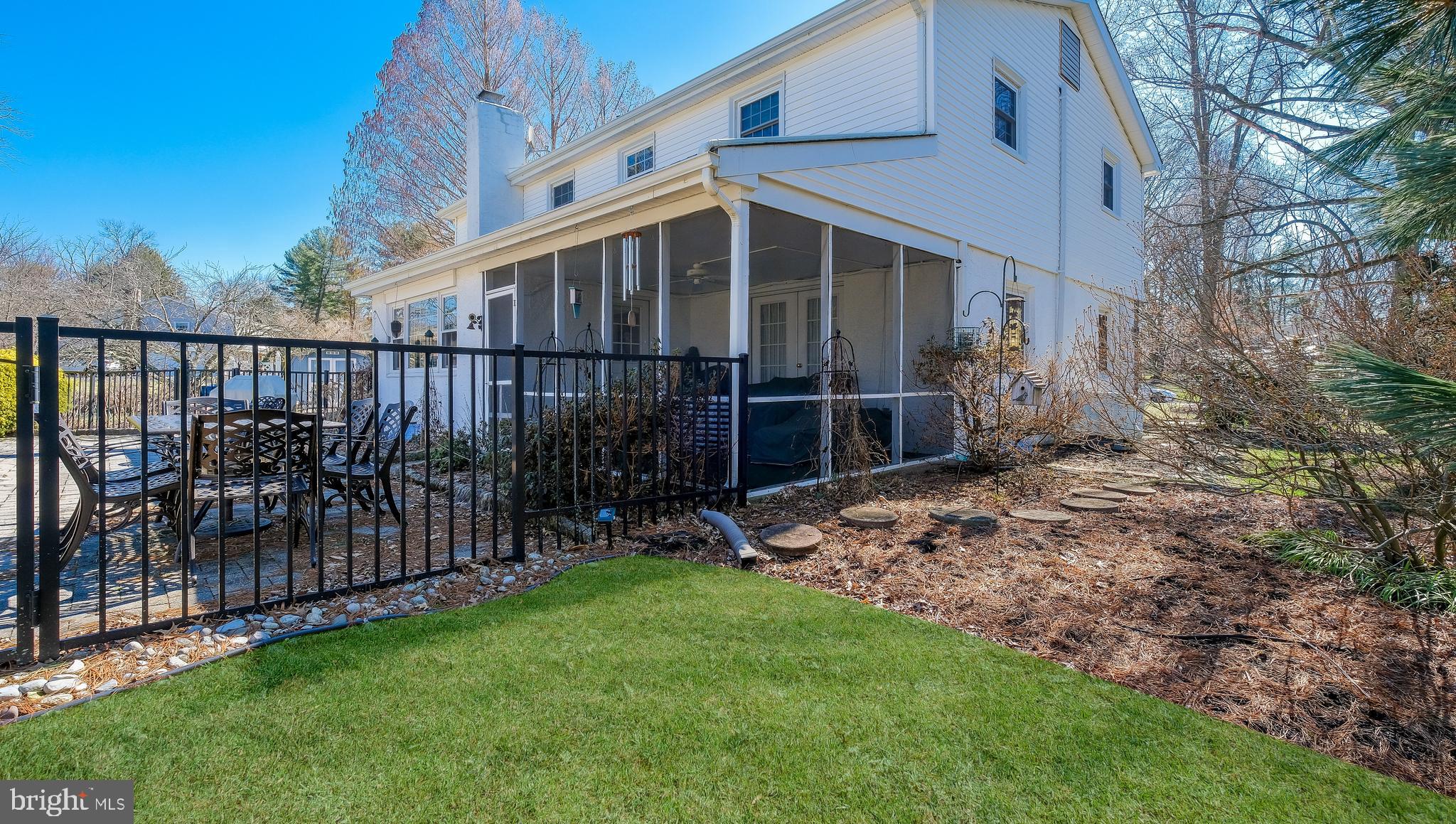 12 Pine Valley Road Doylestown, PA 18901 - Photo 42 of 63 a view of backyard with wooden fence and a large tree