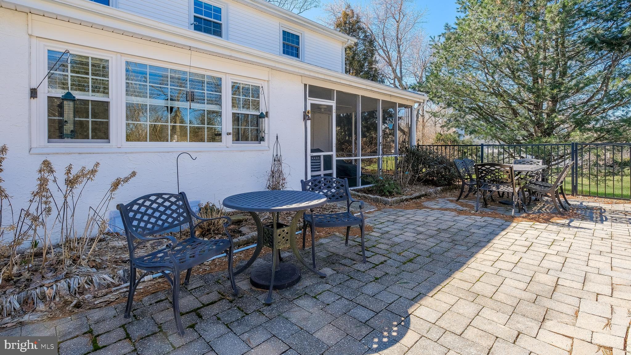 12 Pine Valley Road Doylestown, PA 18901 - Photo 43 of 63 a view of a patio with a table and chairs