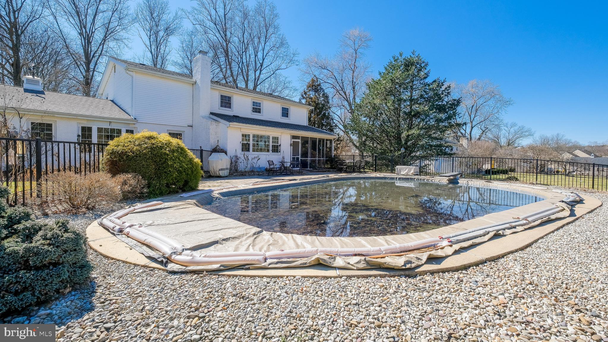 12 Pine Valley Road Doylestown, PA 18901 - Photo 47 of 63 a view of a swimming pool with a house