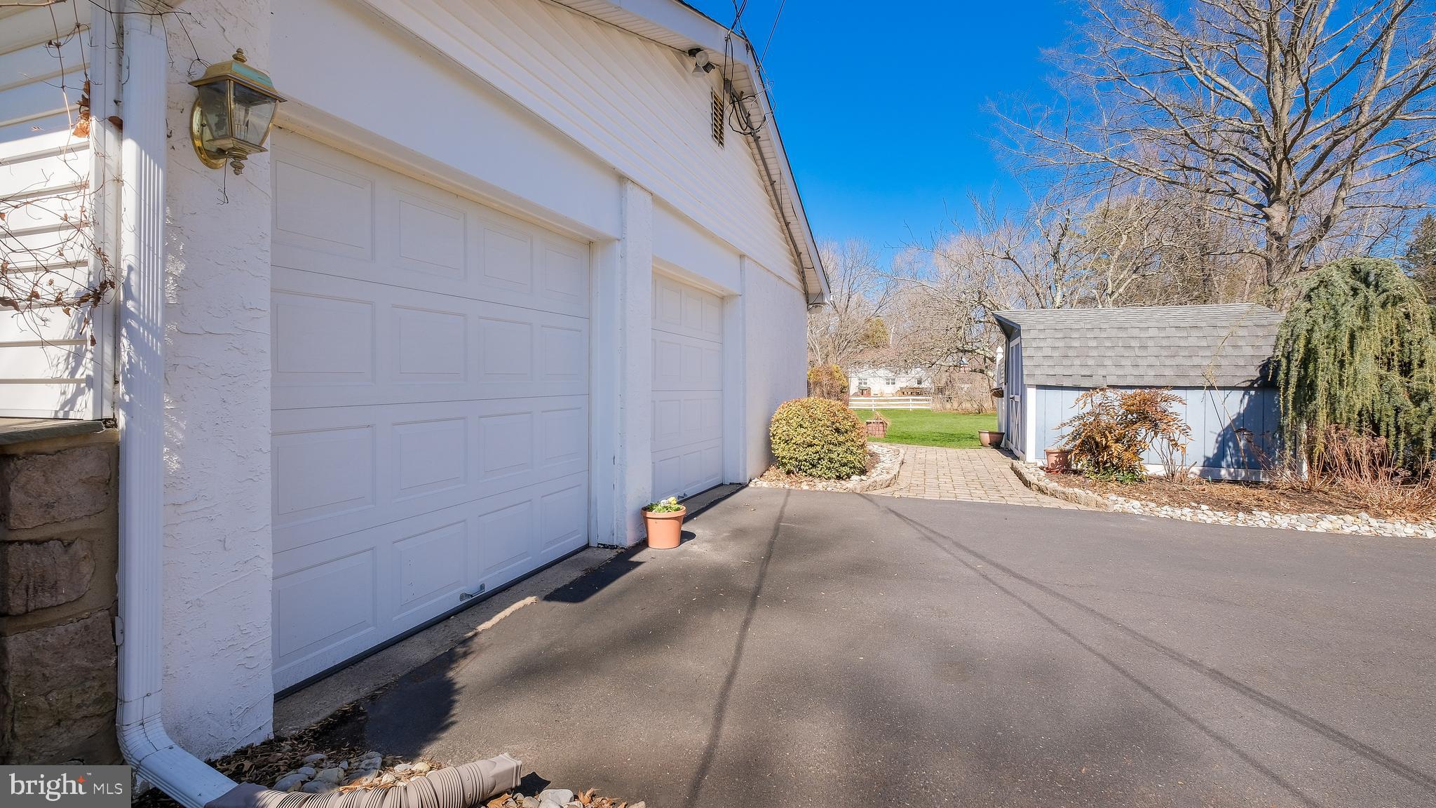 12 Pine Valley Road Doylestown, PA 18901 - Photo 53 of 63 a view of a house with a yard and garage