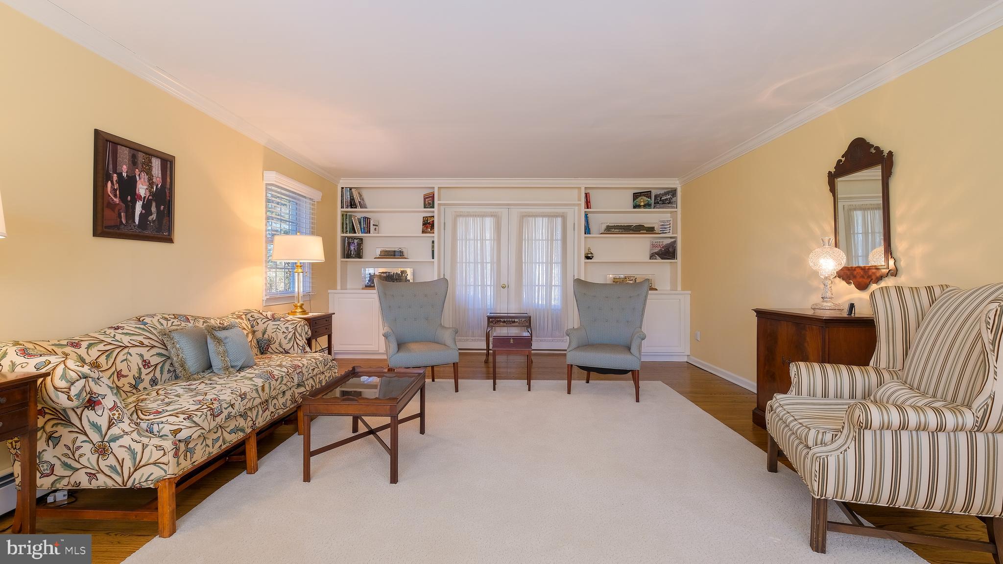 12 Pine Valley Road Doylestown, PA 18901 - Photo 6 of 63 a living room with furniture and a fireplace