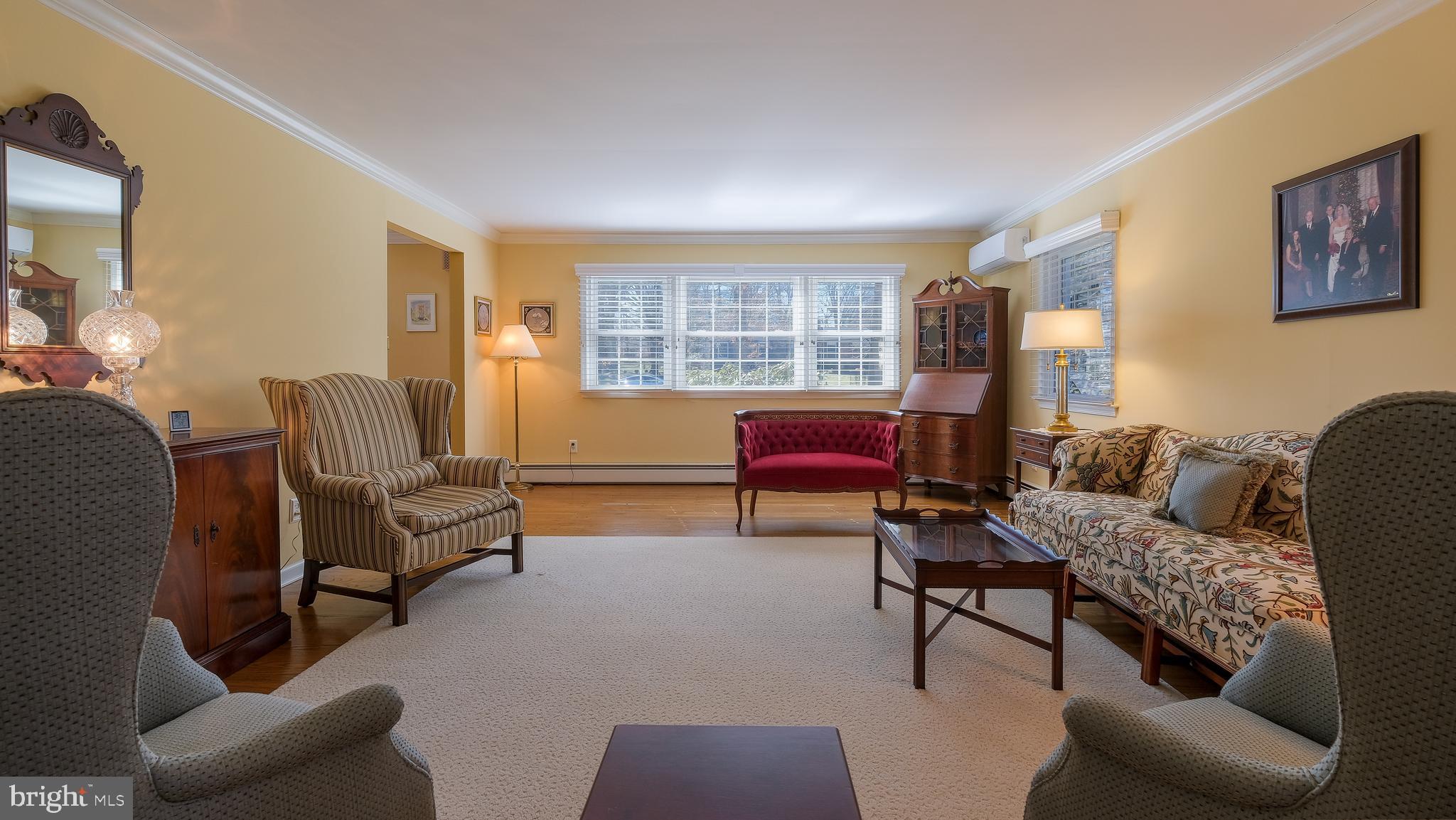 12 Pine Valley Road Doylestown, PA 18901 - Photo 7 of 63 a living room with furniture and a large window