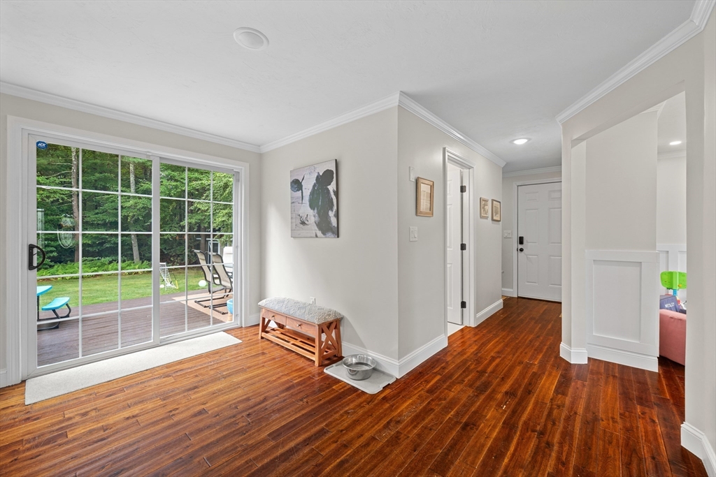 8 Virginia Avenue Sutton, MA 01590 - Photo 11 of 42 a living room with wooden floor and a large window
