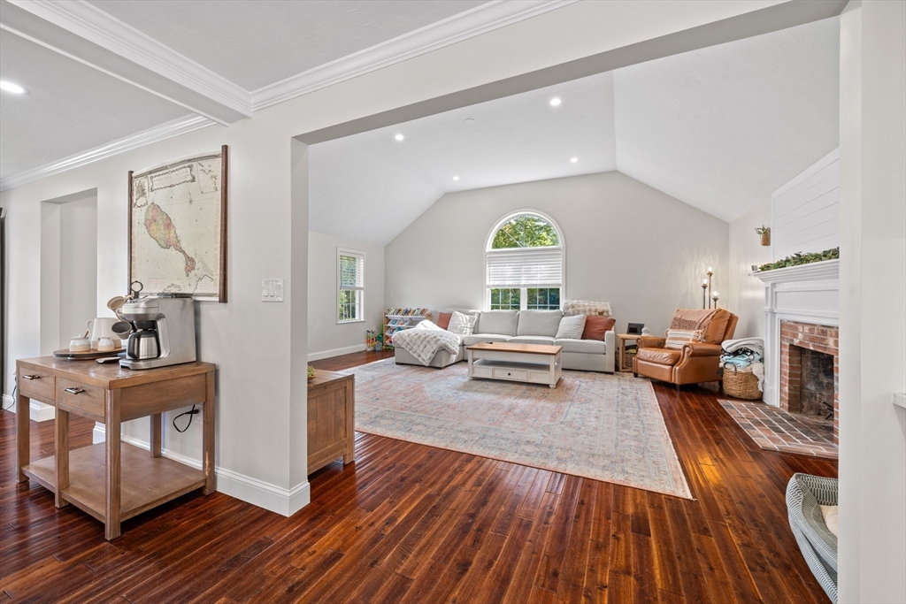 8 Virginia Avenue Sutton, MA 01590 - Photo 13 of 42 a living room with furniture and a fireplace