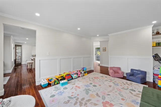 a bedroom with furniture and flowers