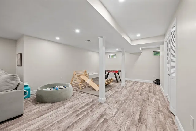 a view of a livingroom with wooden floor