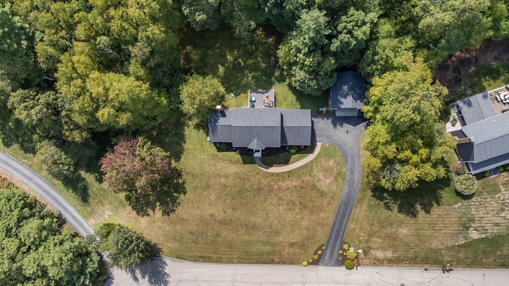 8 Virginia Avenue Sutton, MA 01590 - Photo 36 of 42 an aerial view of a house with a garden