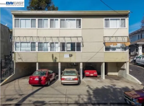 a front view of a house with parking