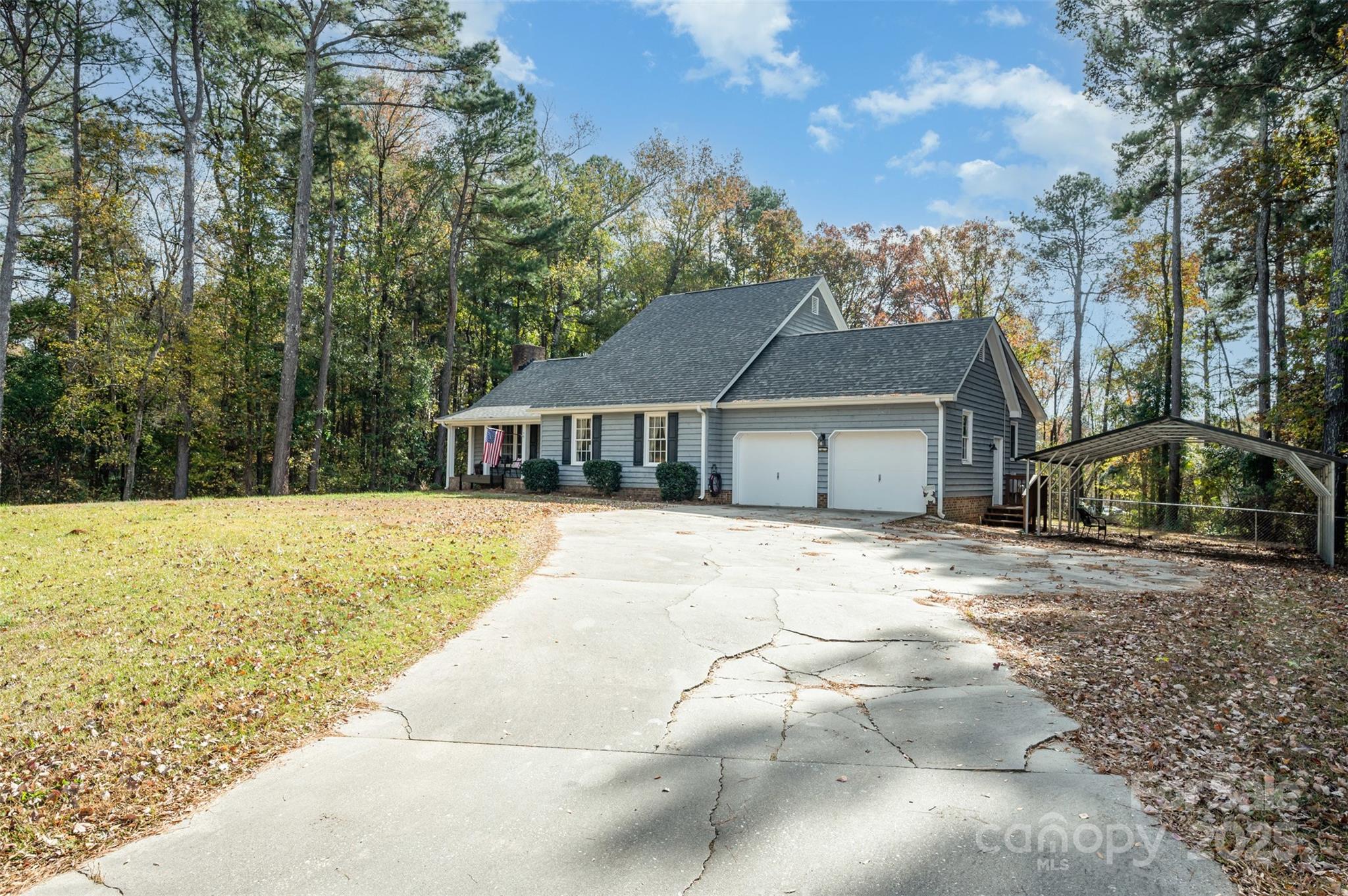 302 Nottingham Way Wadesboro, NC 28170 - Photo 16 of 30 a front view of a house with a yard