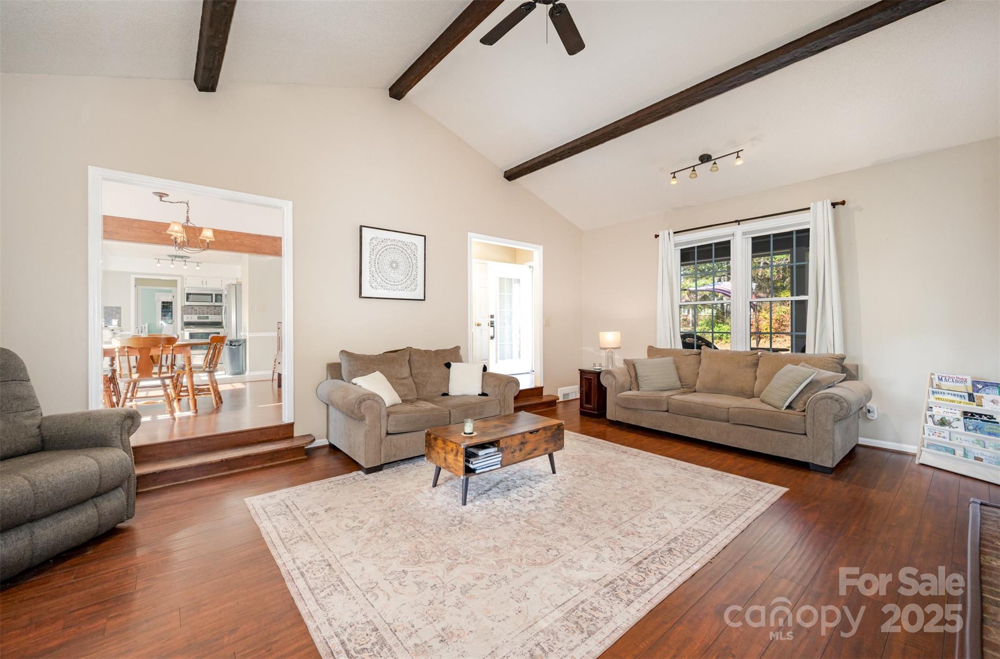 302 Nottingham Way Wadesboro, NC 28170 - Photo 20 of 30 a living room with furniture wooden floor and a large window