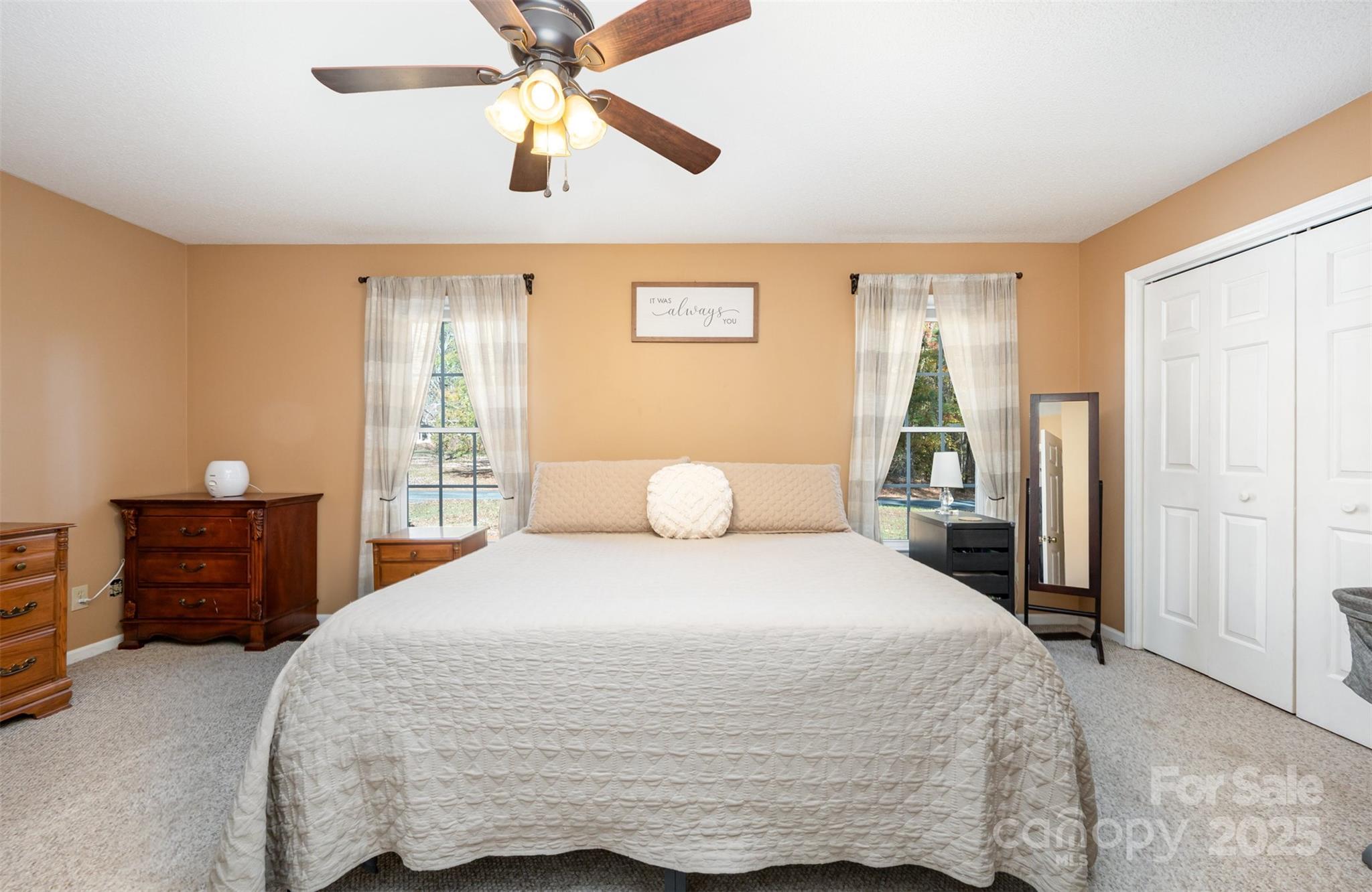 302 Nottingham Way Wadesboro, NC 28170 - Photo 24 of 30 a bedroom with a bed and a closet