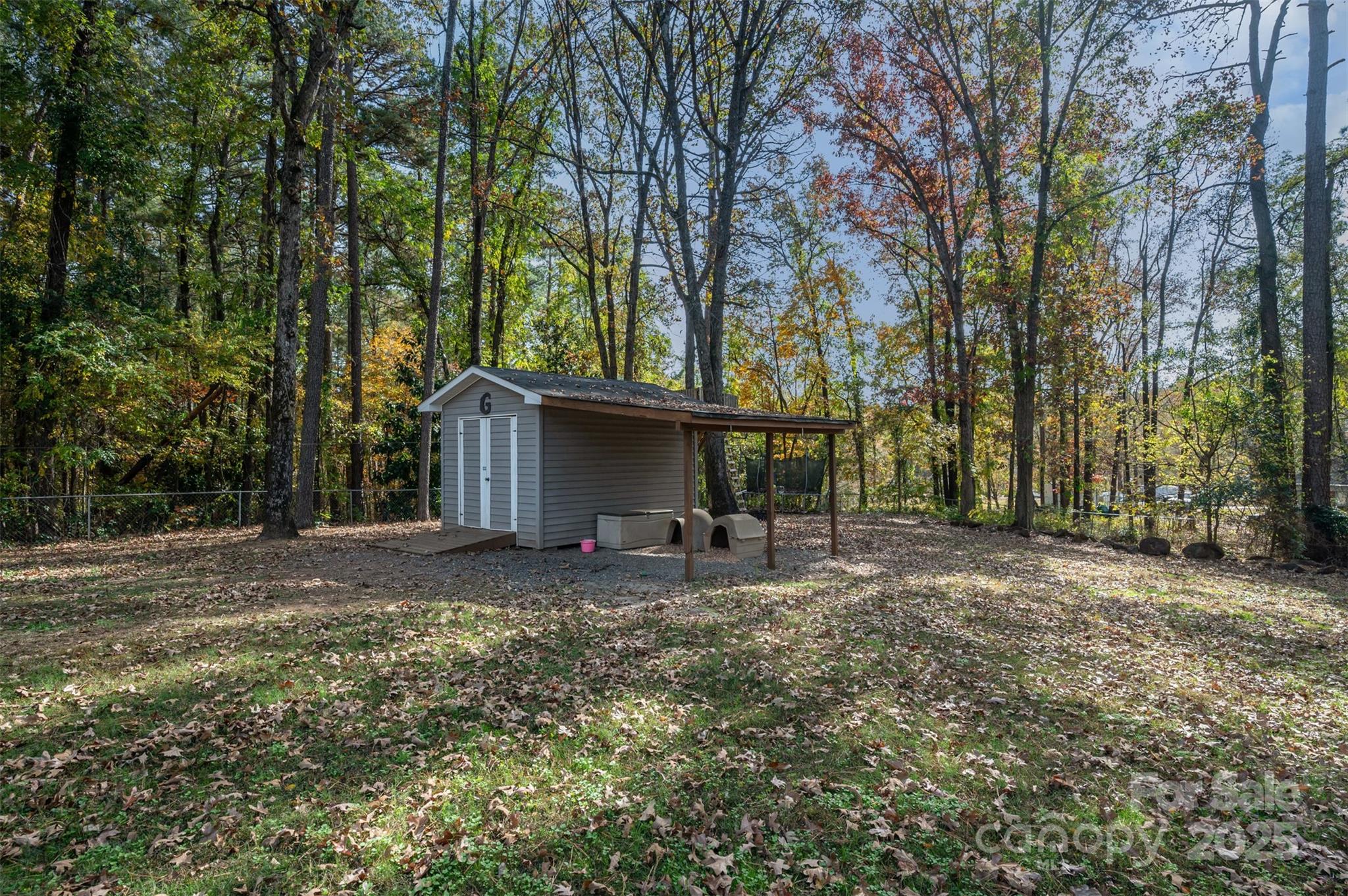 302 Nottingham Way Wadesboro, NC 28170 - Photo 28 of 30 a view of a house with backyard and trees