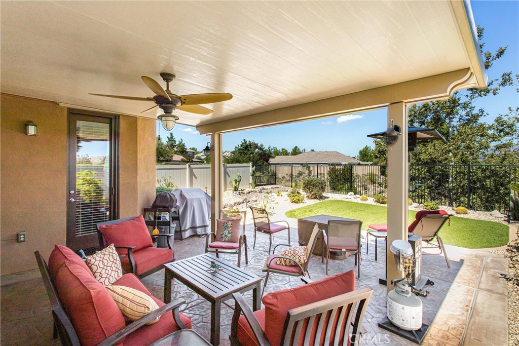 1476 Signal Peak Beaumont, CA 92223 - Photo 27 of 50 a view of a dining room with furniture window and outside view