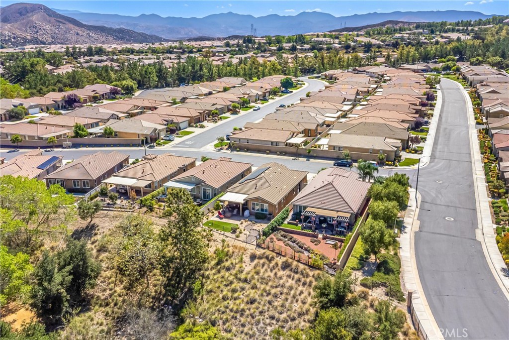 1476 Signal Peak Beaumont, CA 92223 - Photo 34 of 50 an aerial view of residential houses with outdoor space