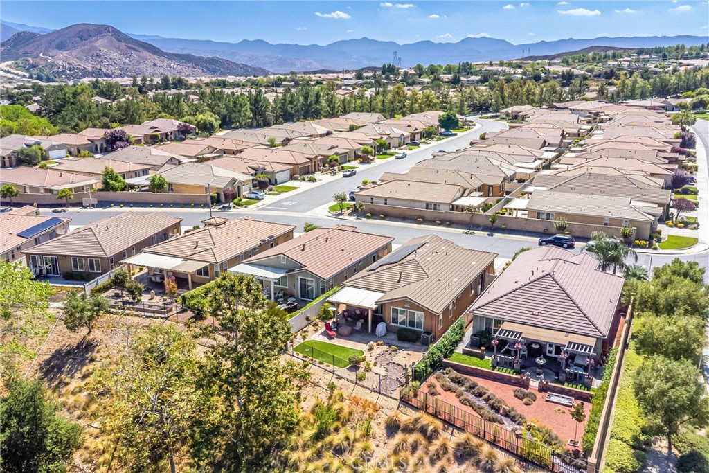 1476 Signal Peak Beaumont, CA 92223 - Photo 37 of 50 an aerial view of residential houses and outdoor space