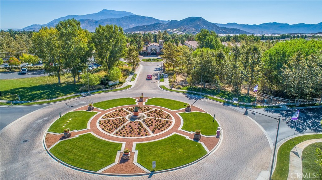 1476 Signal Peak Beaumont, CA 92223 - Photo 49 of 50 a view of a swimming pool with a garden