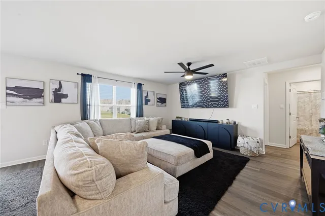 a living room with furniture and a couch