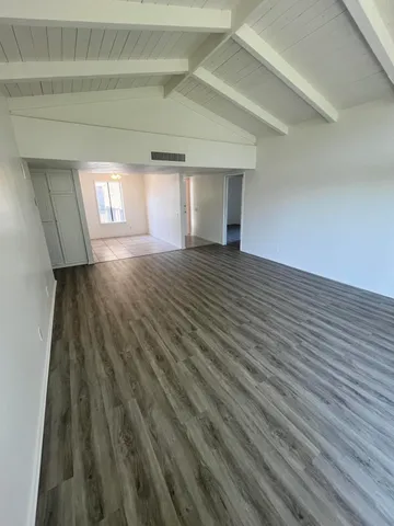 a view of an empty room and window