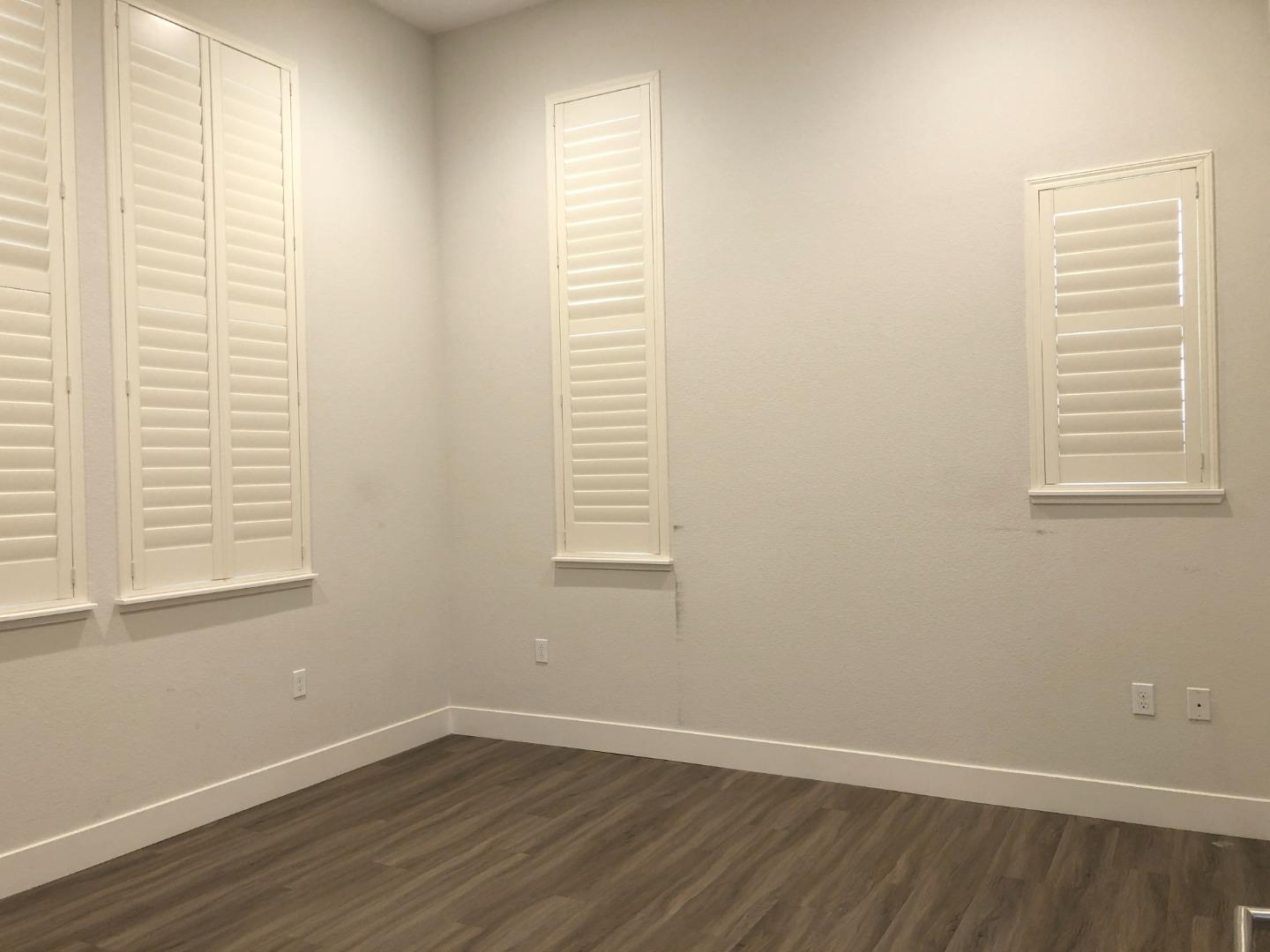 215 Houret Drive Milpitas, CA 95035 - Photo 6 of 14 an empty room with a window
