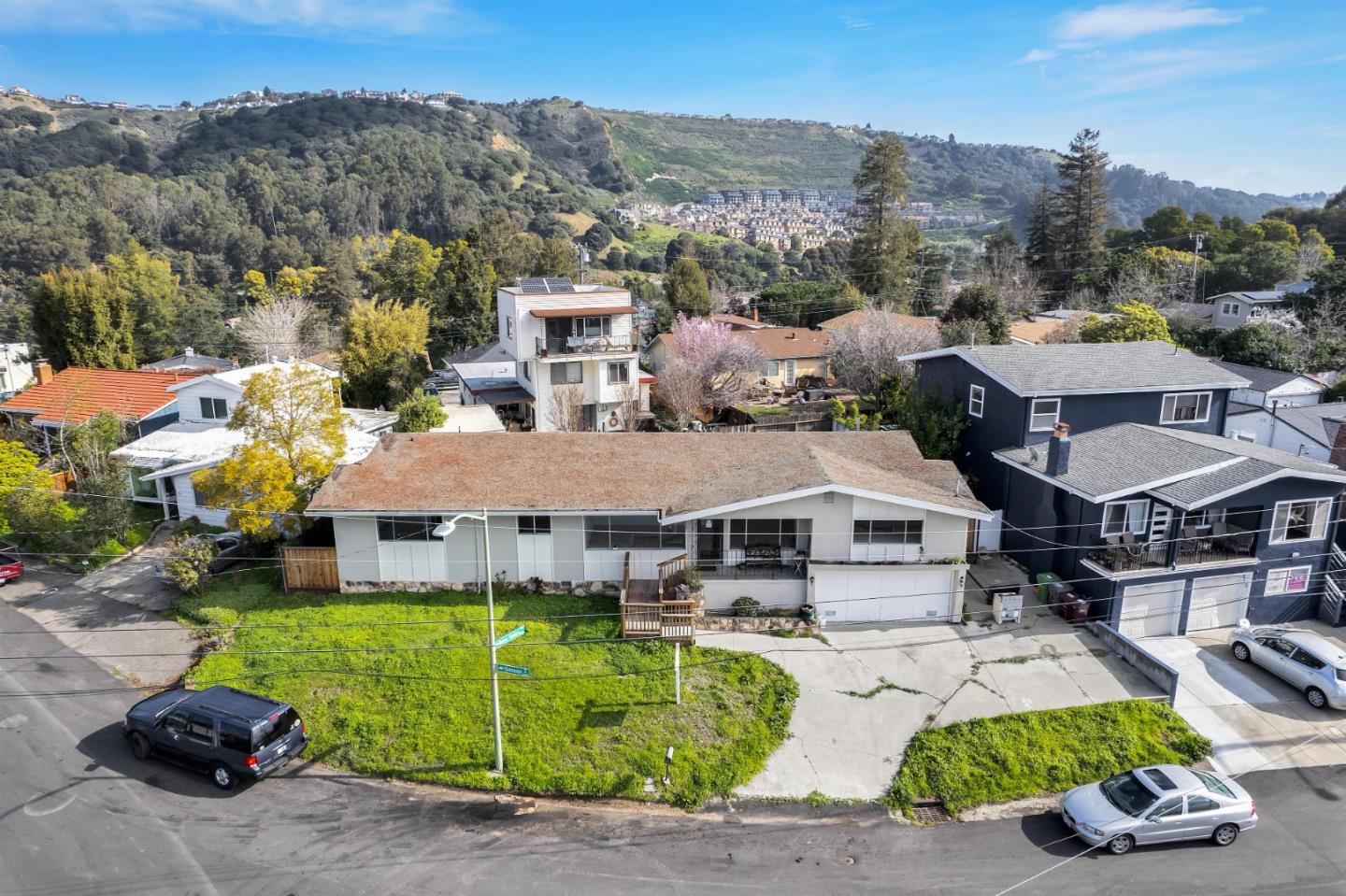 6530 Simson Street Oakland, CA 94605 - Photo 2 of 14 an aerial view of a house with garden space and street view