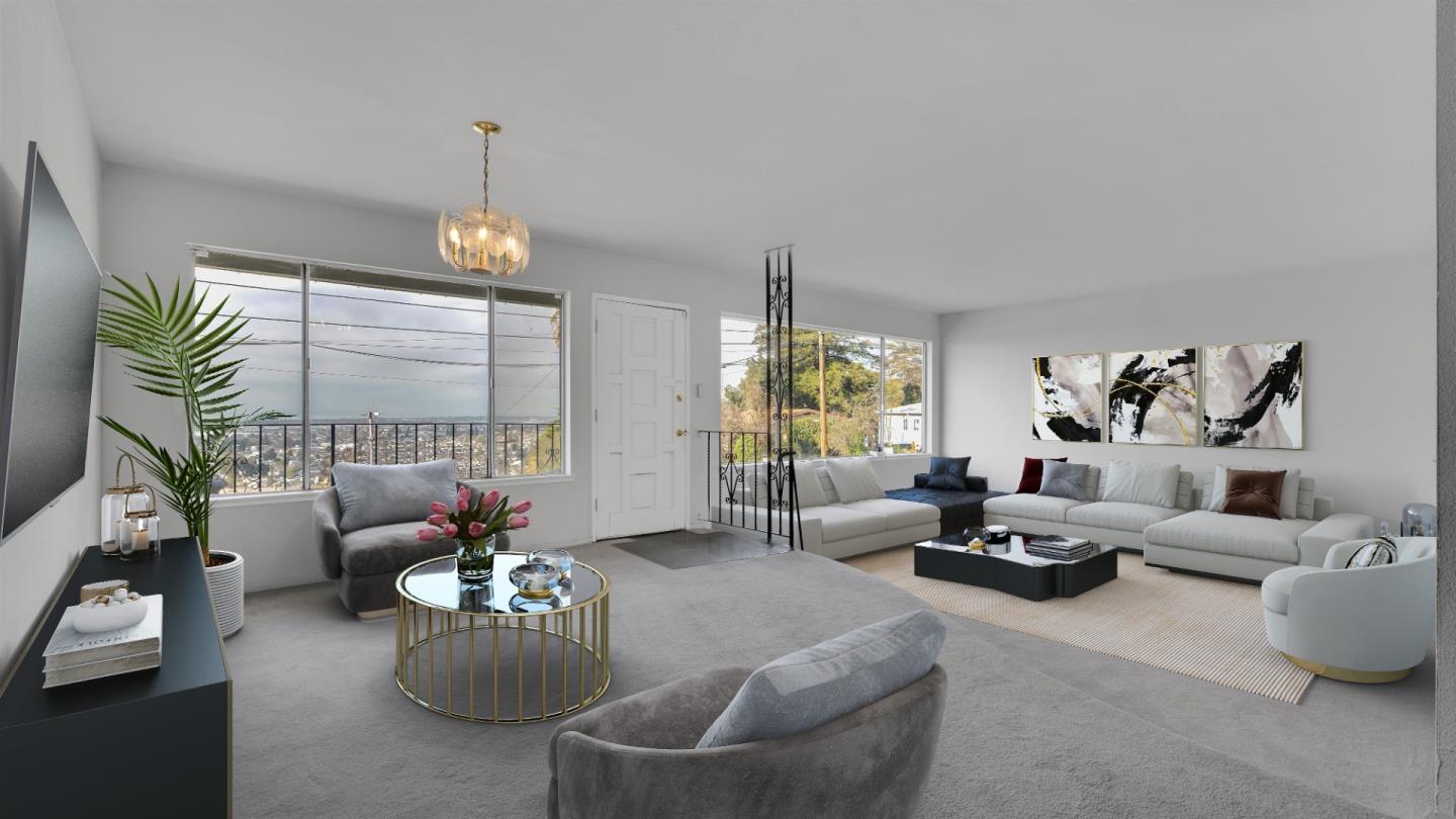 6530 Simson Street Oakland, CA 94605 - Photo 3 of 14 a living room with furniture and a large window