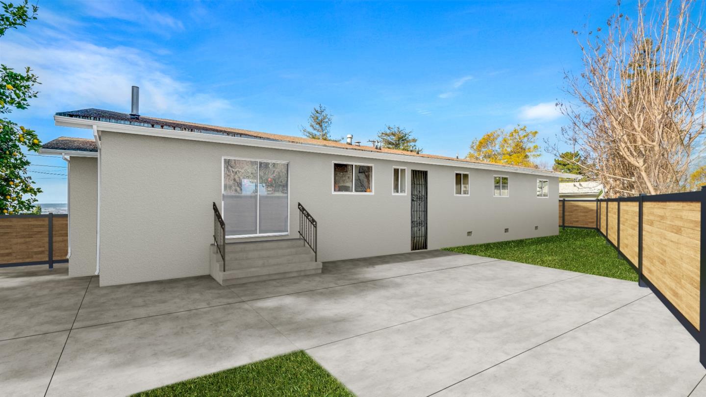 6530 Simson Street Oakland, CA 94605 - Photo 7 of 14 a view of a house with a backyard