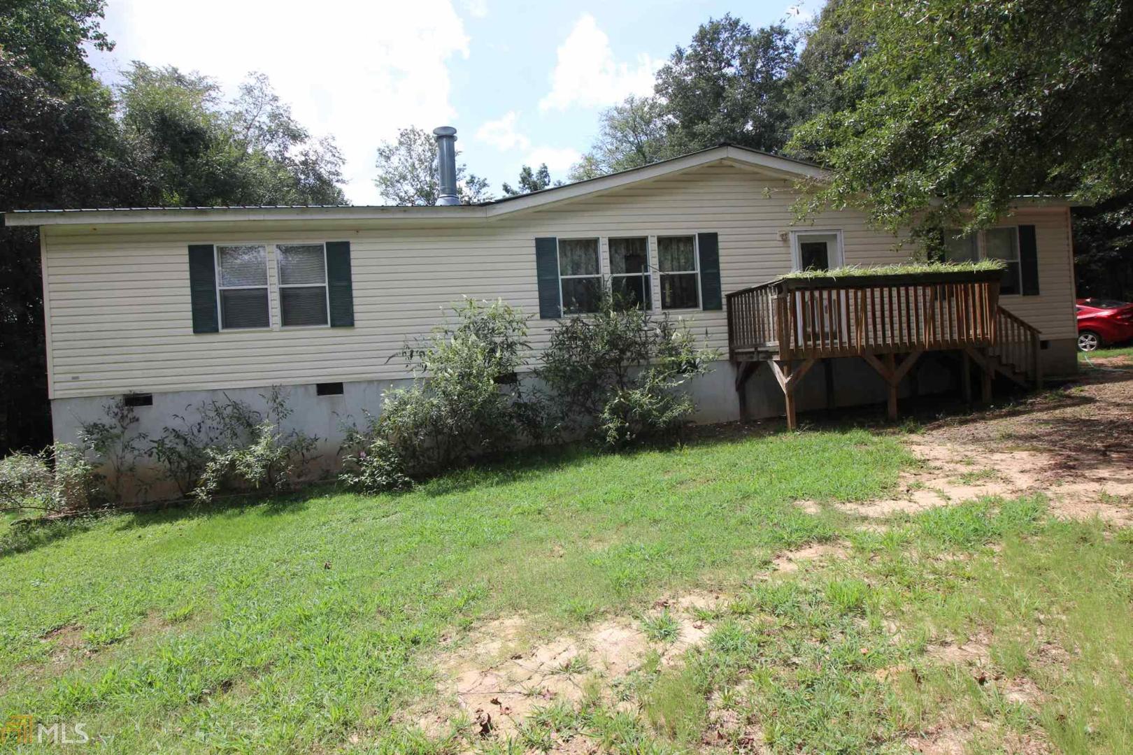 276 Westfall Road Royston, GA 30662 - Photo 1 of 1 a front view of a house with garden