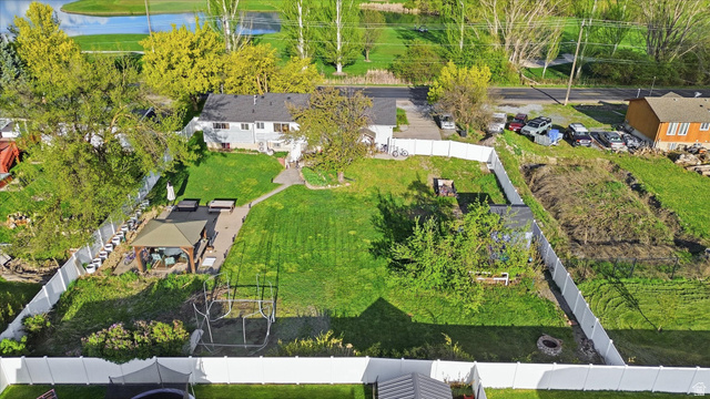 1095 Park Avenue Logan, UT 84321 - Photo 25 of 27 Aerial view of residential area and Logan River Golf Course pond