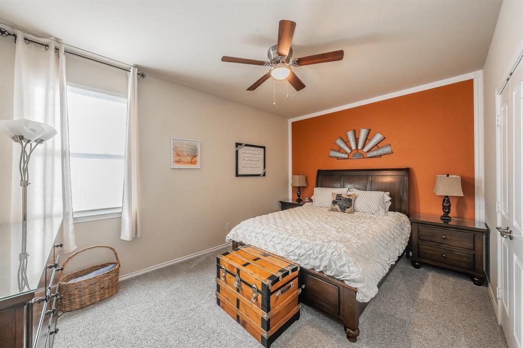 10417 Boxthorn Court Fort Worth, TX 76177 - Photo 29 of 40 a bedroom with a bed and window