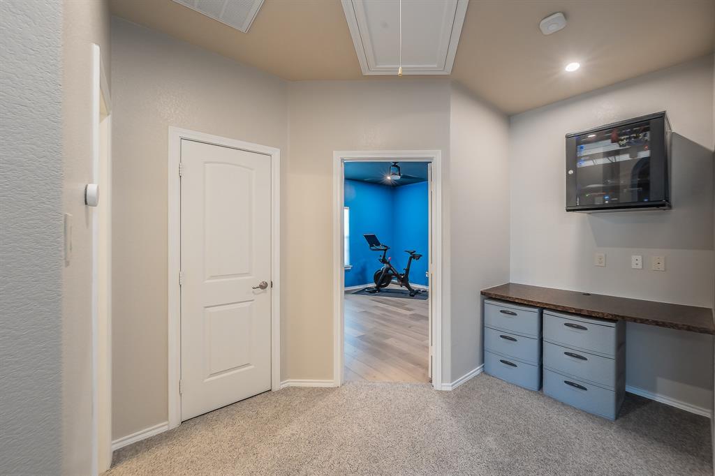 10417 Boxthorn Court Fort Worth, TX 76177 - Photo 32 of 40 wooden floor and closet in a room